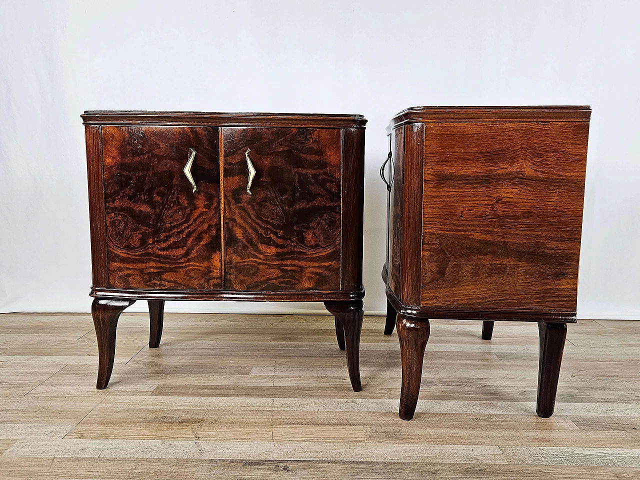 Pair of walnut bedside tables with brass handles and wavy legs, 1950s 3