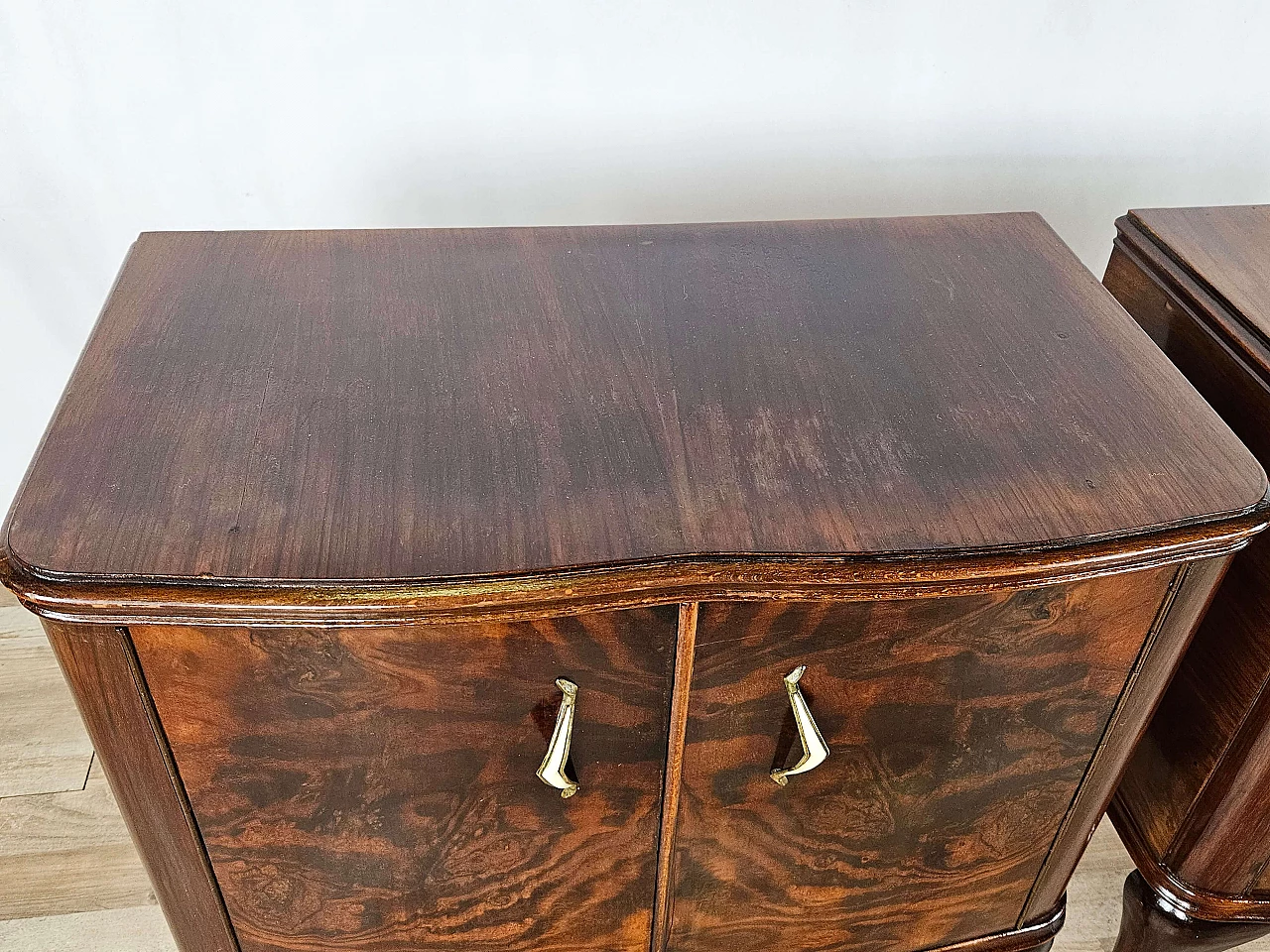 Pair of walnut bedside tables with brass handles and wavy legs, 1950s 6