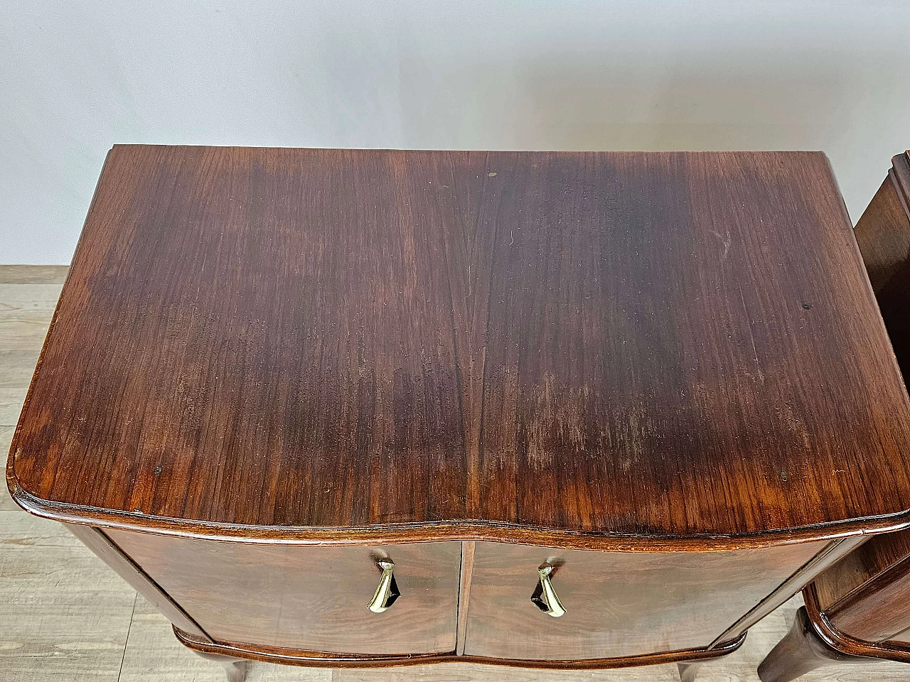 Pair of walnut bedside tables with brass handles and wavy legs, 1950s 7