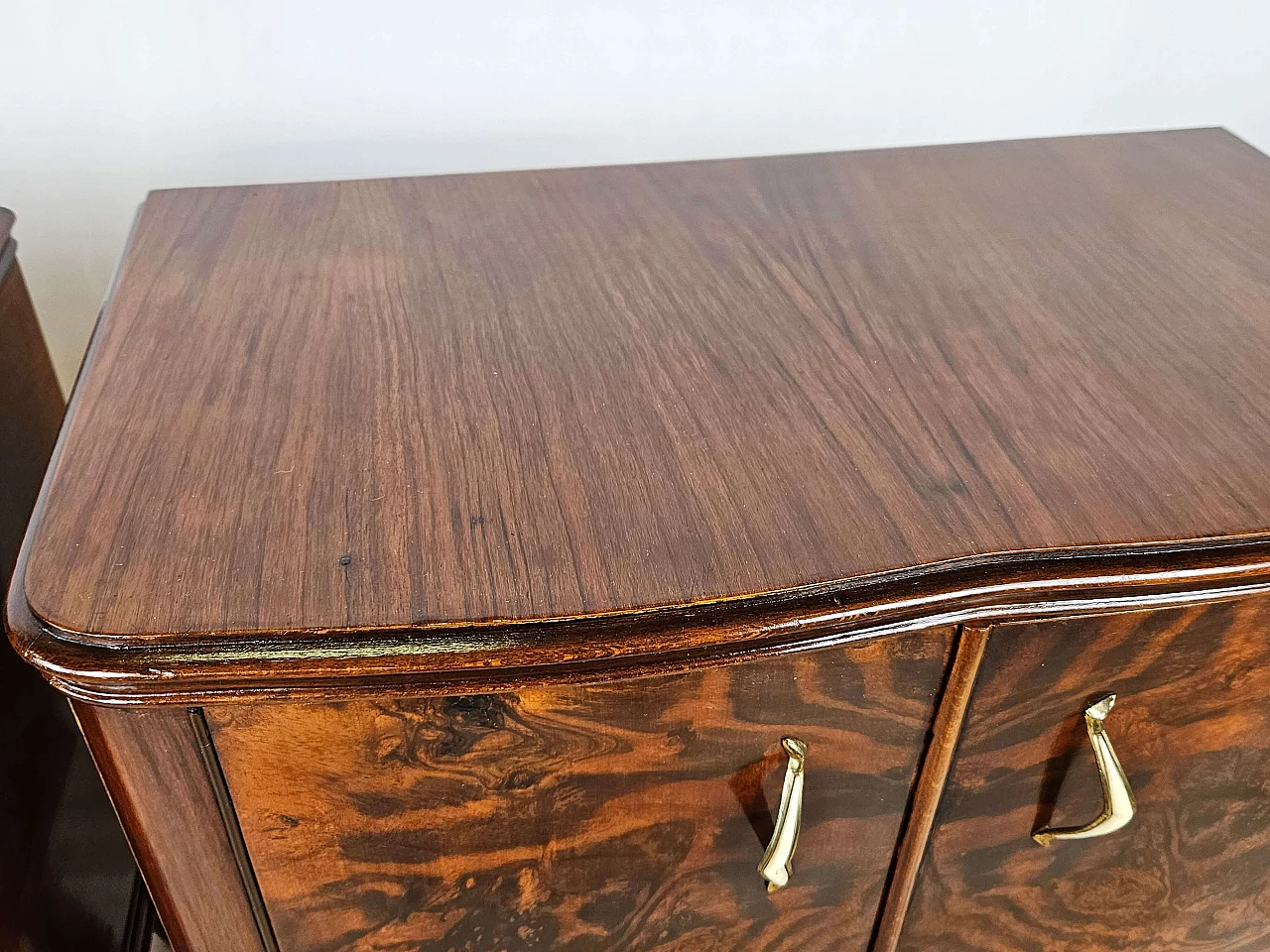 Pair of walnut bedside tables with brass handles and wavy legs, 1950s 9