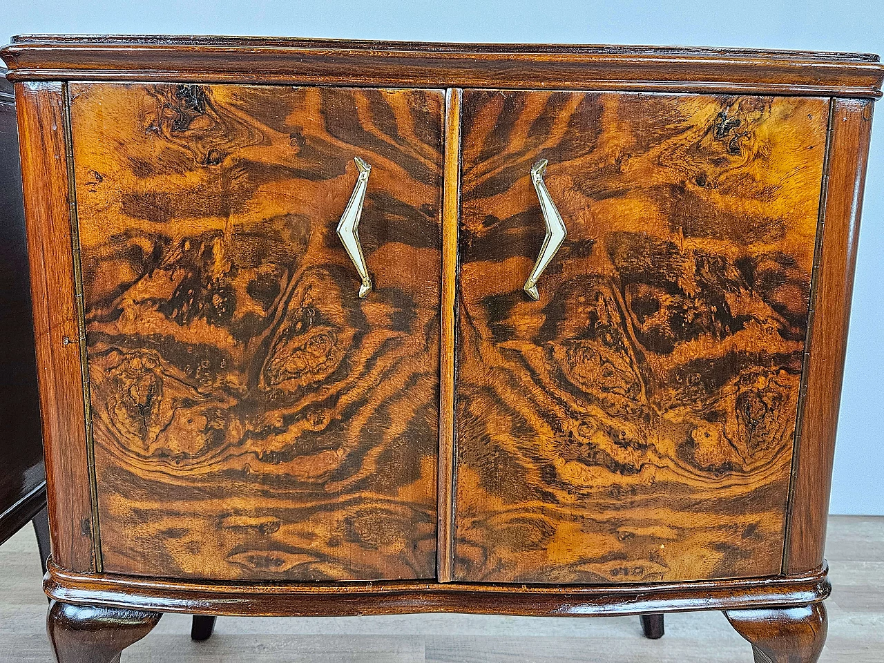 Pair of walnut bedside tables with brass handles and wavy legs, 1950s 26