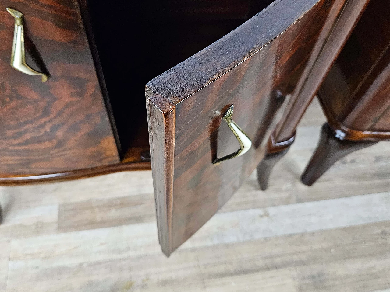 Pair of walnut bedside tables with brass handles and wavy legs, 1950s 28