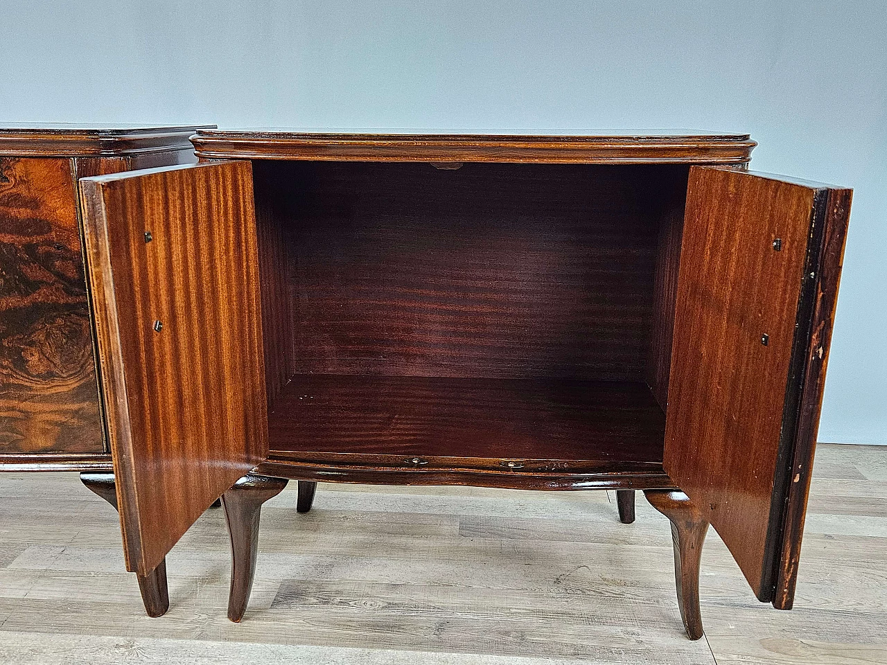 Pair of walnut bedside tables with brass handles and wavy legs, 1950s 32