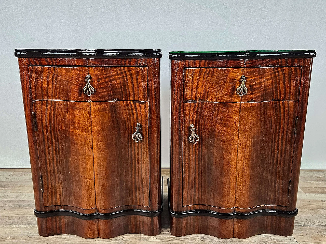 Pair of mahogany and ebony bedside tables with black glass top, 1950s 1