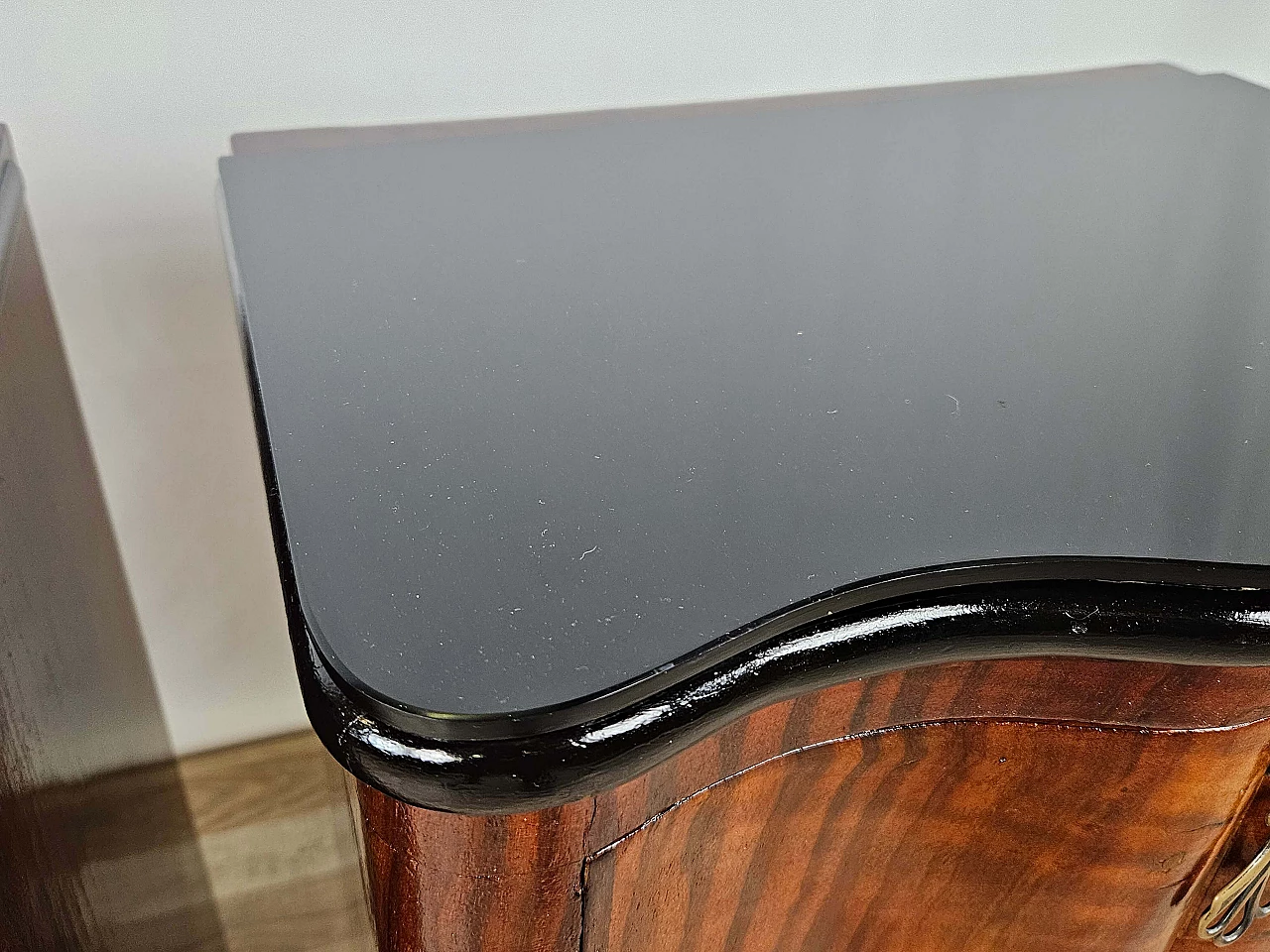 Pair of mahogany and ebony bedside tables with black glass top, 1950s 12