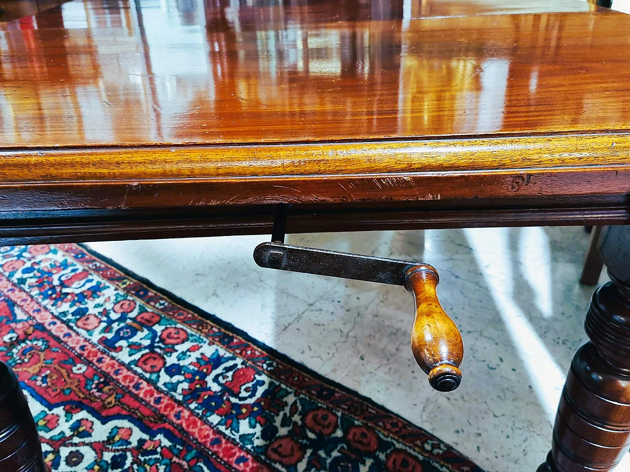 English mahogany extendable table with casters, late 19th century 5