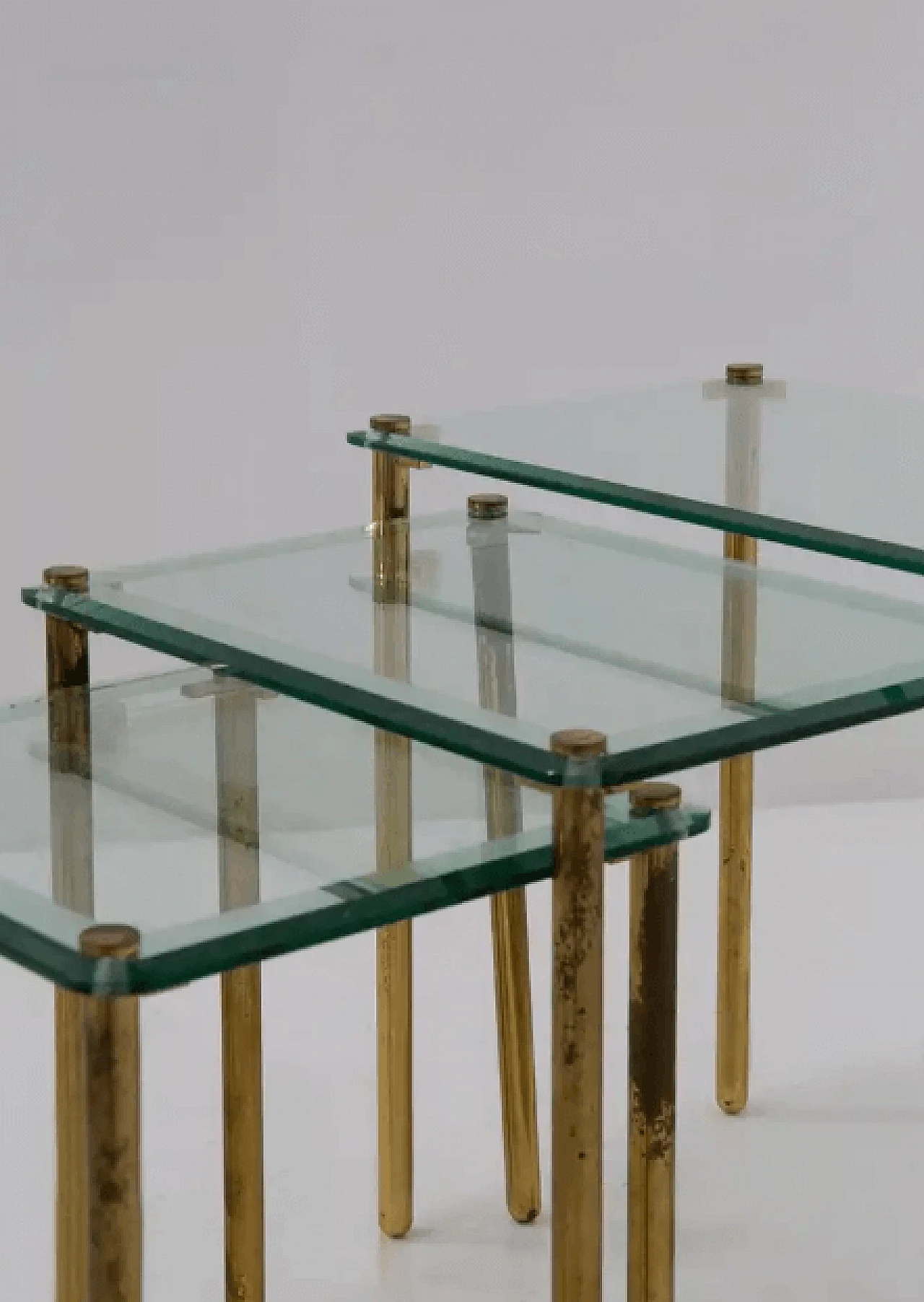 Triptych of small tables in thick glass and brass, 1960s 9