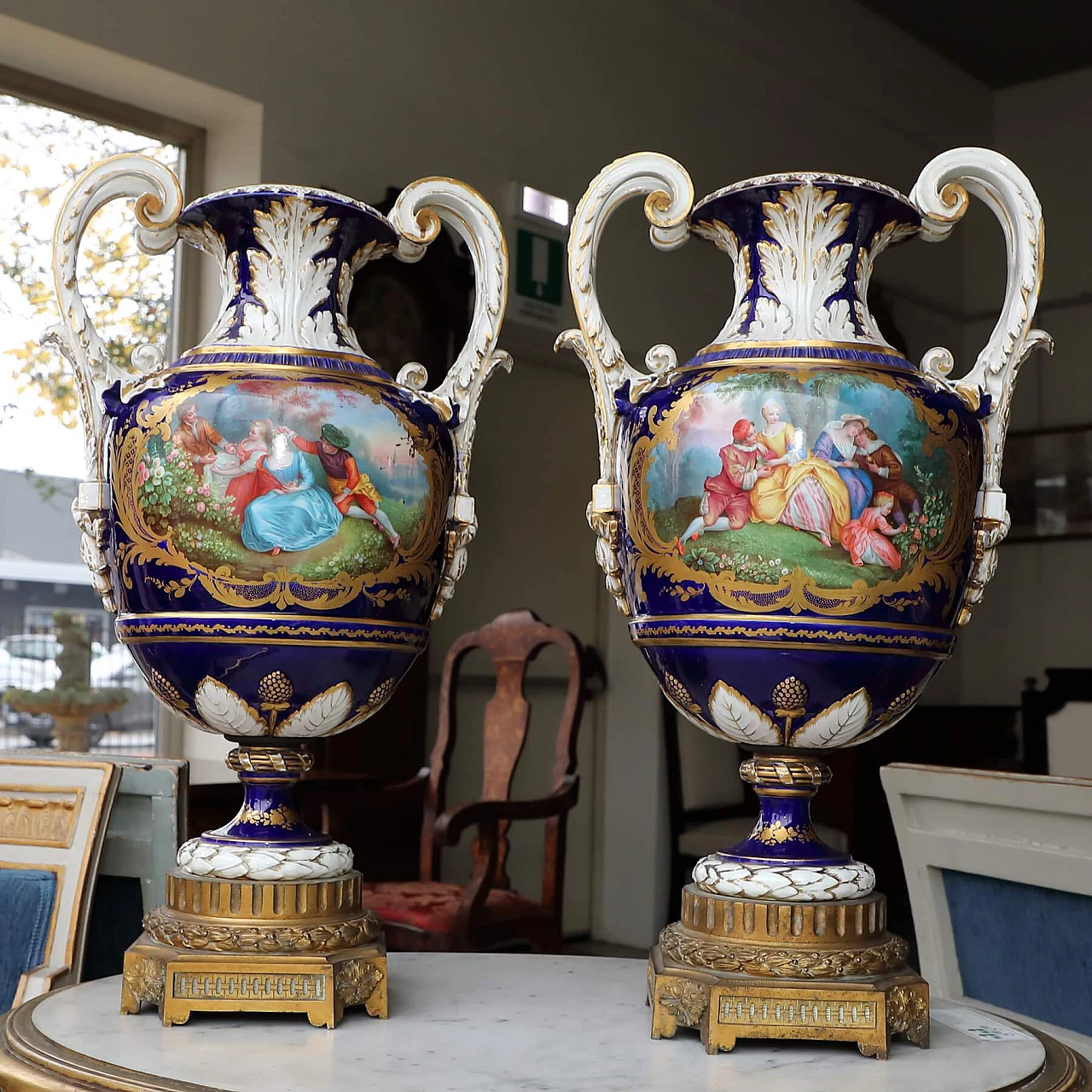 Pair of polychrome porcelain and gilded bronze vases, 19th century 1