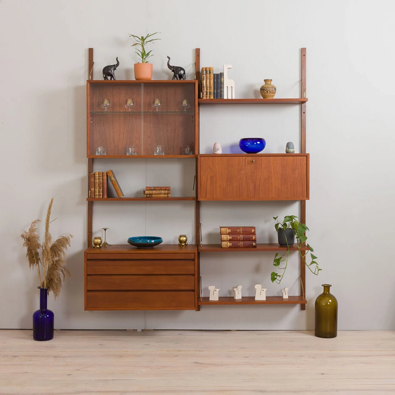 Wall-mounted teak bookcase with bar cabinet and drawer unit by Poul Cadovious for Cado, 1960s 1