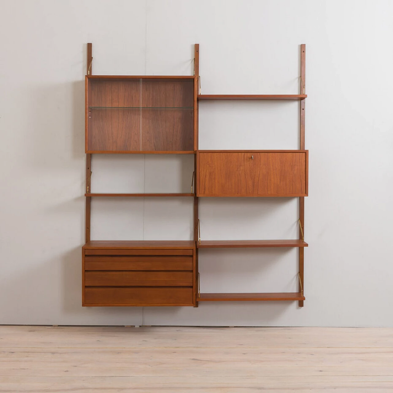 Wall-mounted teak bookcase with bar cabinet and drawer unit by Poul Cadovious for Cado, 1960s 3