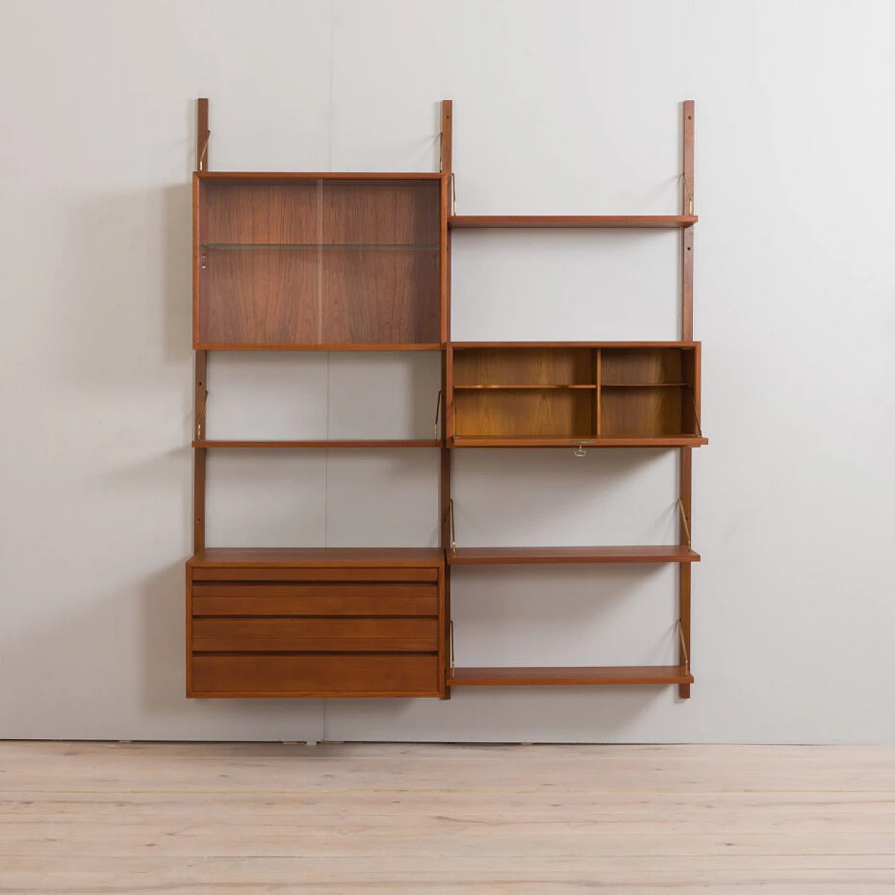 Wall-mounted teak bookcase with bar cabinet and drawer unit by Poul Cadovious for Cado, 1960s 4