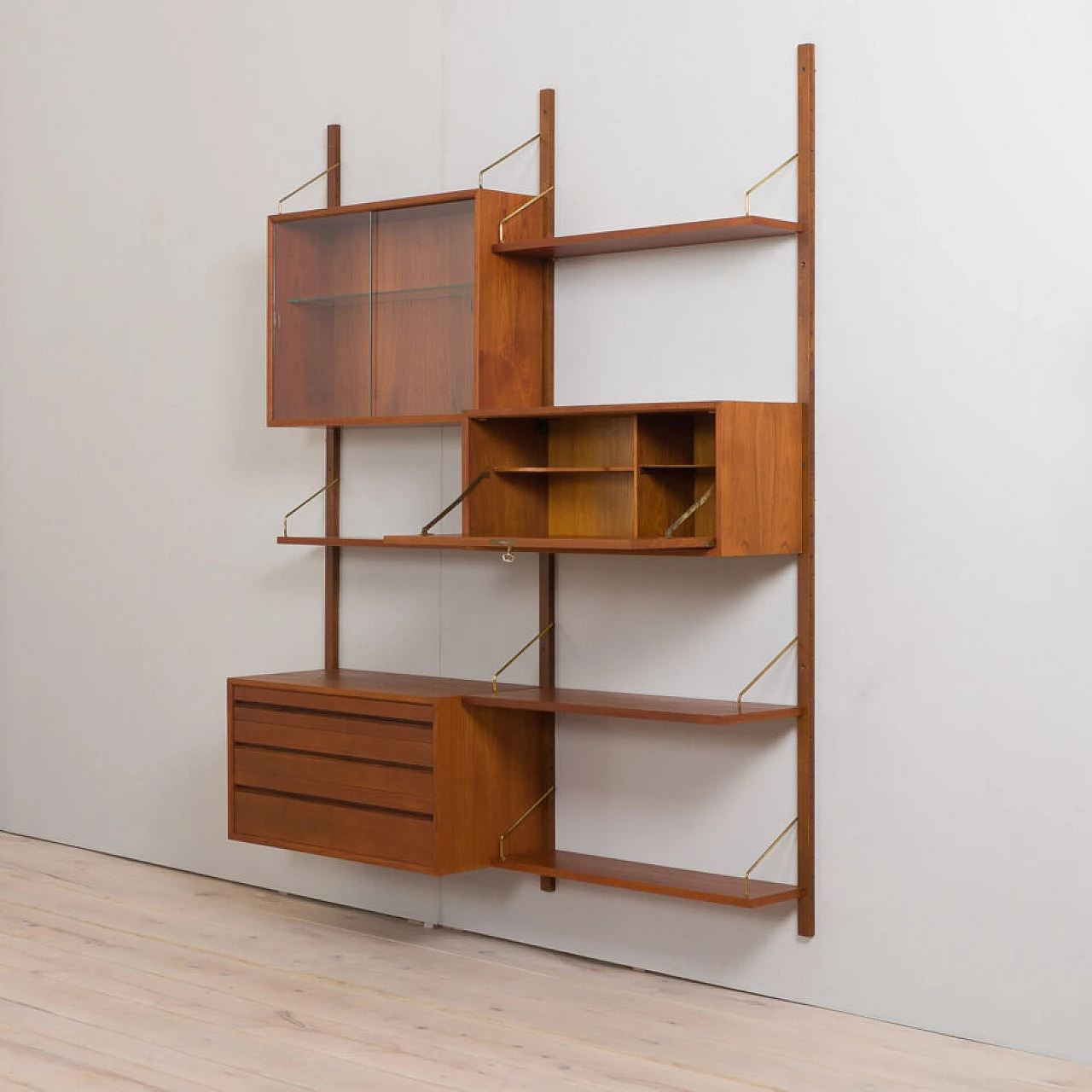 Wall-mounted teak bookcase with bar cabinet and drawer unit by Poul Cadovious for Cado, 1960s 5