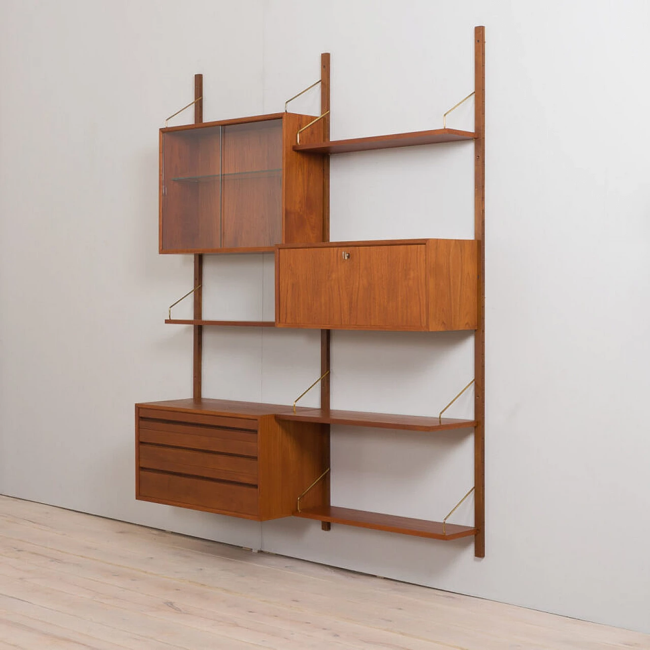 Wall-mounted teak bookcase with bar cabinet and drawer unit by Poul Cadovious for Cado, 1960s 6