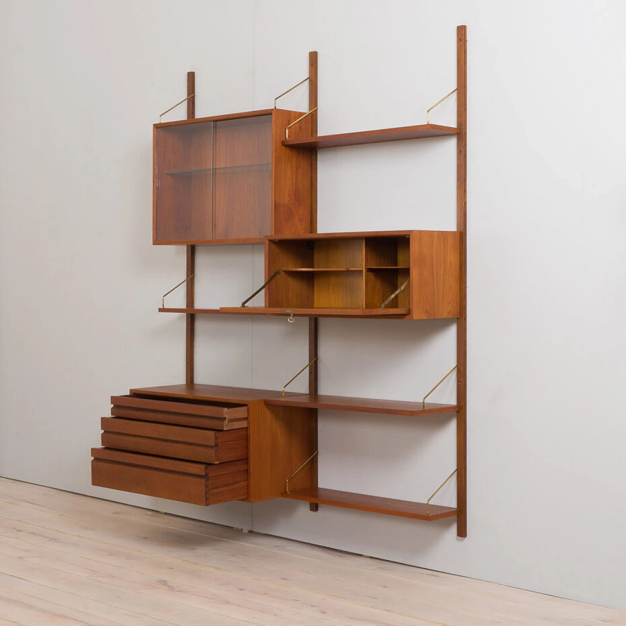 Wall-mounted teak bookcase with bar cabinet and drawer unit by Poul Cadovious for Cado, 1960s 7