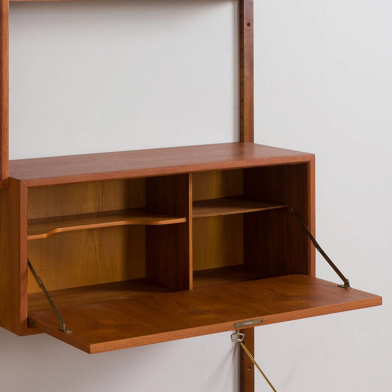 Wall-mounted teak bookcase with bar cabinet and drawer unit by Poul Cadovious for Cado, 1960s 8