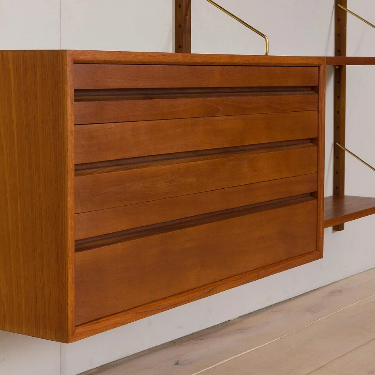 Wall-mounted teak bookcase with bar cabinet and drawer unit by Poul Cadovious for Cado, 1960s 10