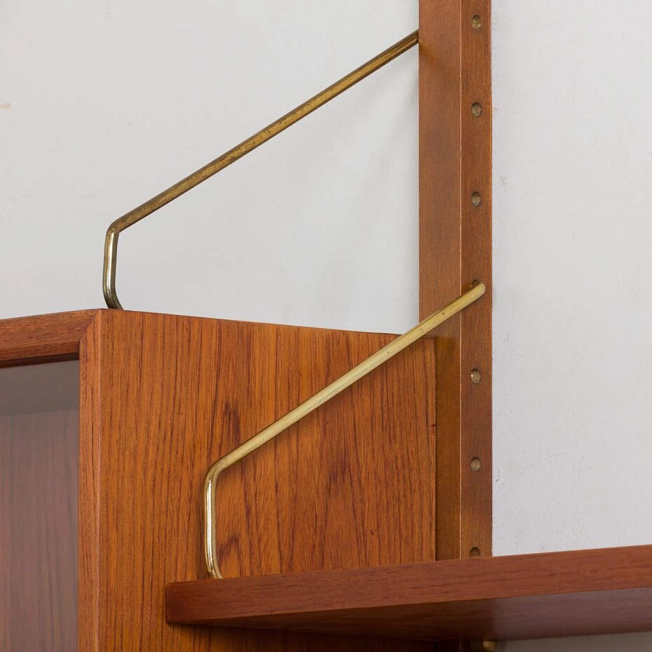 Wall-mounted teak bookcase with bar cabinet and drawer unit by Poul Cadovious for Cado, 1960s 13