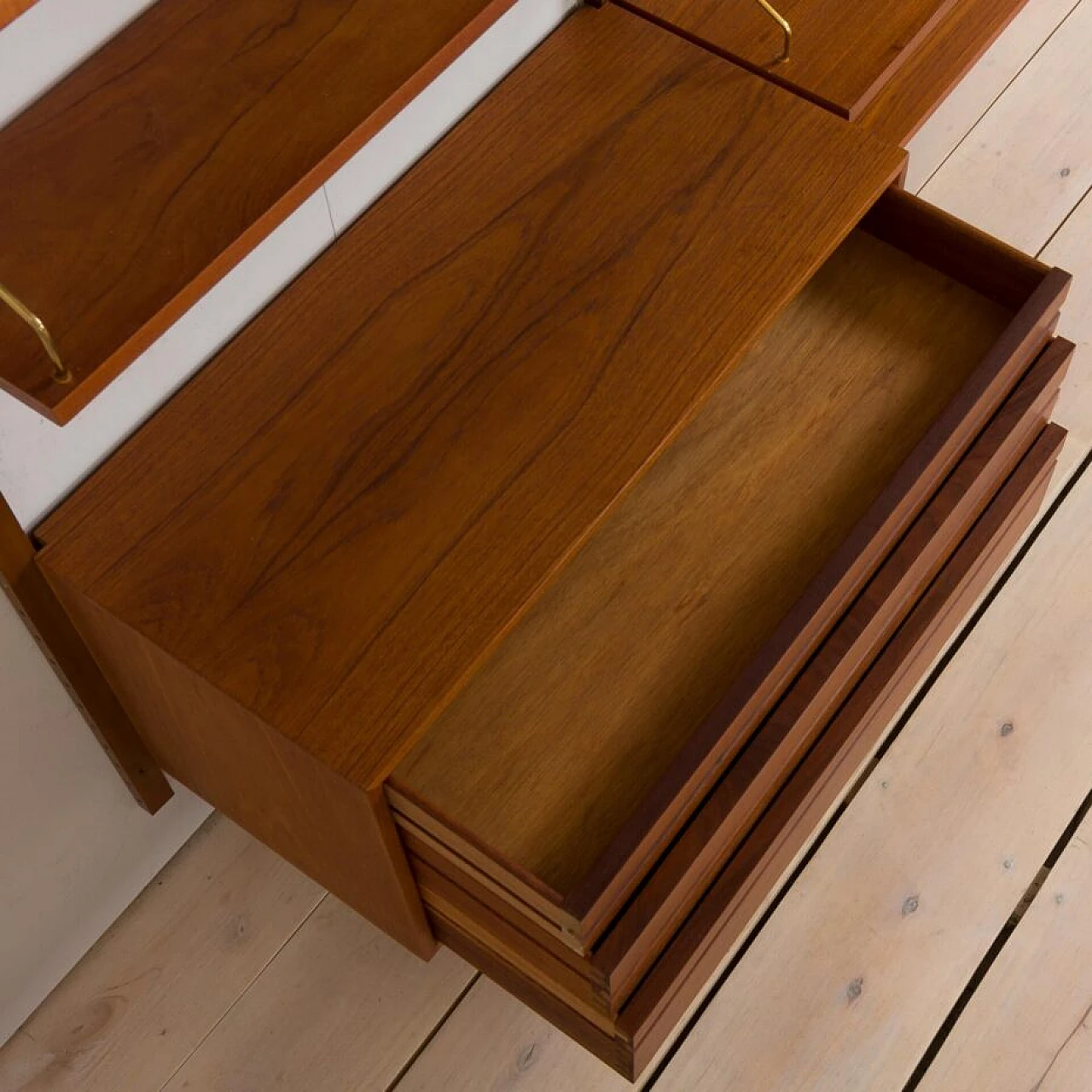 Wall-mounted teak bookcase with bar cabinet and drawer unit by Poul Cadovious for Cado, 1960s 16