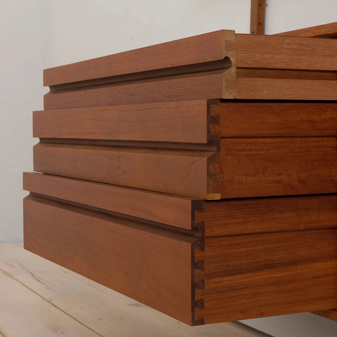 Wall-mounted teak bookcase with bar cabinet and drawer unit by Poul Cadovious for Cado, 1960s 17