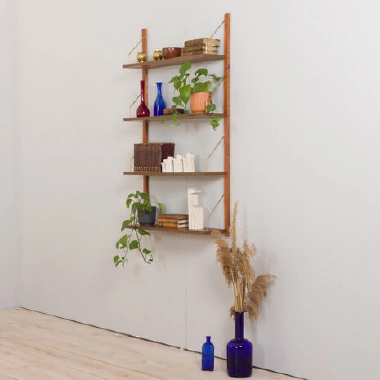 Teak and brass hanging bookcase in the style of Poul Cadovius, 1960s 2