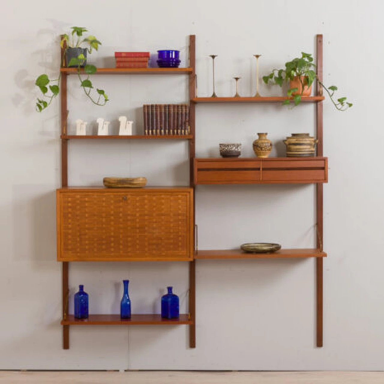 Teak and brass hanging bookcase by Poul Cadovius for Cado, 1960s 1