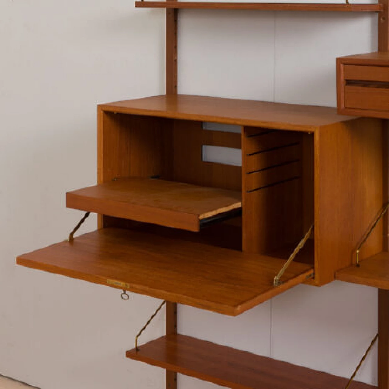 Teak and brass hanging bookcase by Poul Cadovius for Cado, 1960s 10