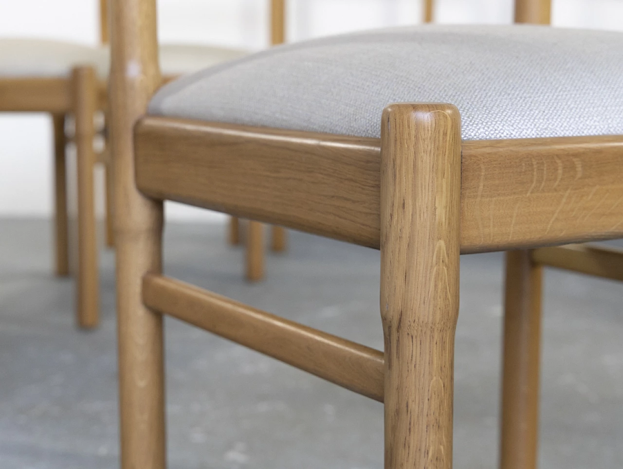 12 oak and fabric chairs, 1970s 11