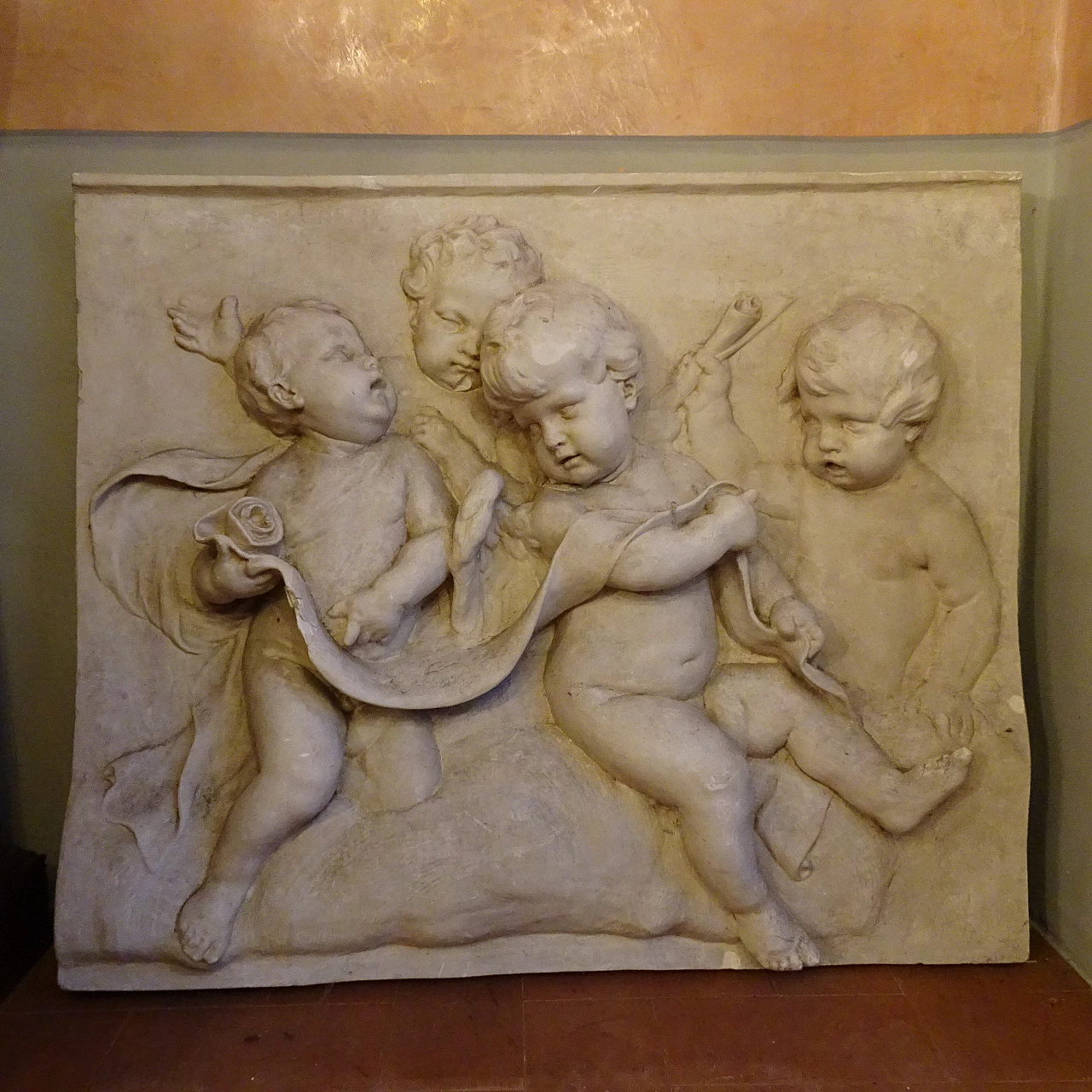 Plaster panel with high-relief of putti, early 20th century 1