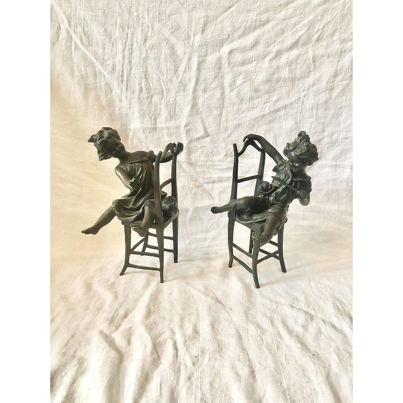 Pair of Art Deco bronze sculptures of girls with cats, 1940s 1