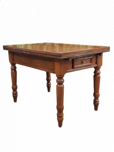 Extending solid walnut table with drawers, 19th century