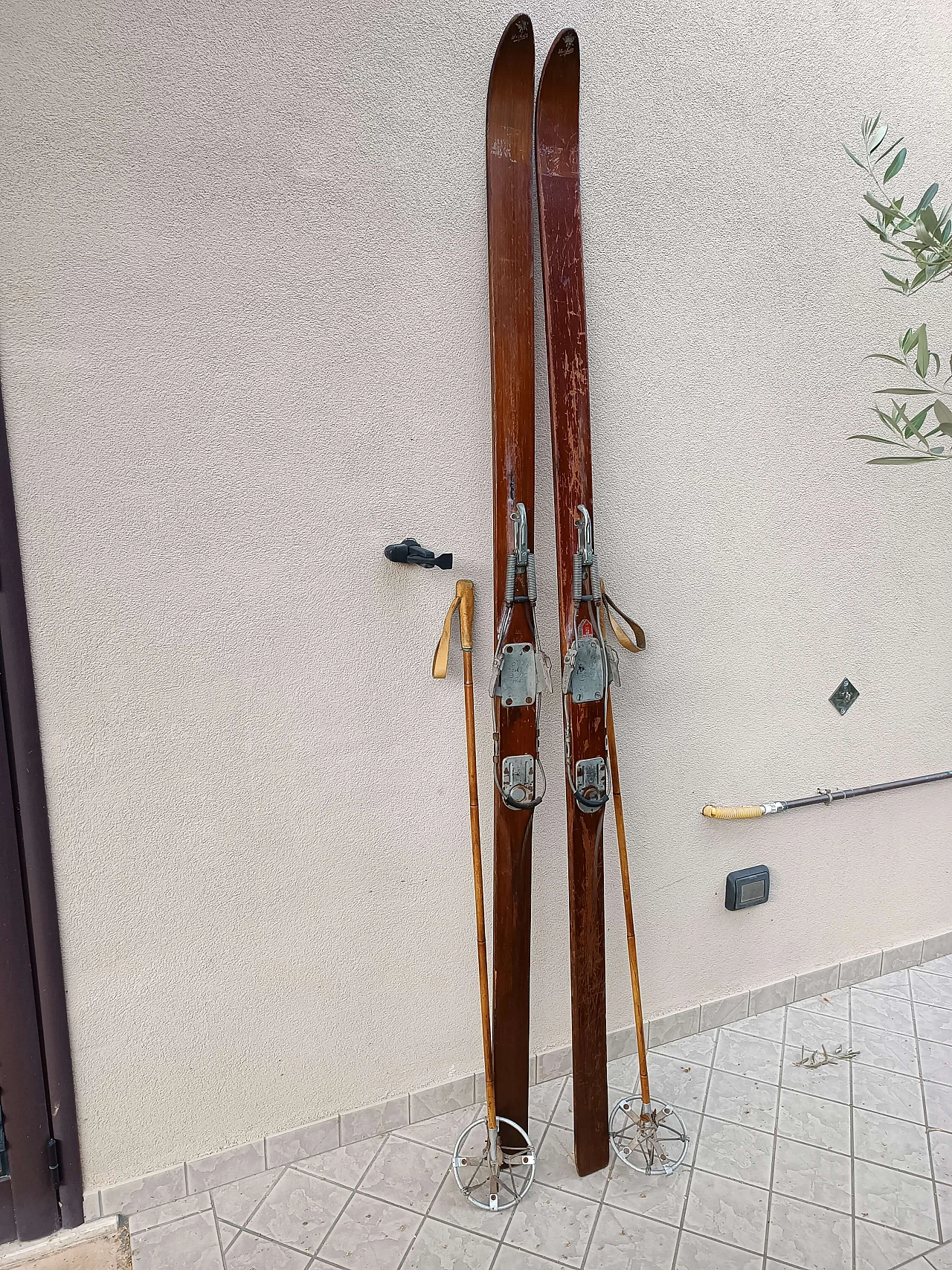 Pair of wood skis with leather and bamboo poles by Cober, 1950s 1