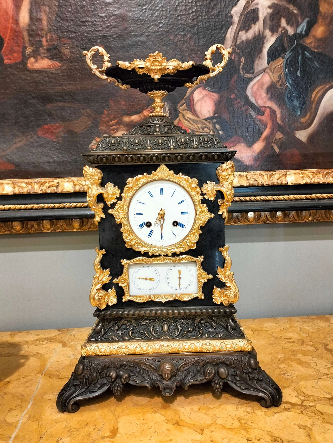 Gilt and burnished bronze Napoleon III clock with porcelain dial, 1850 1