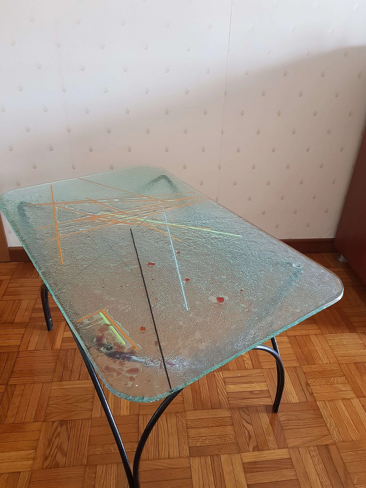 Wrought iron coffee table with painted glass top by Pietro Arnoldi, 1980s 3