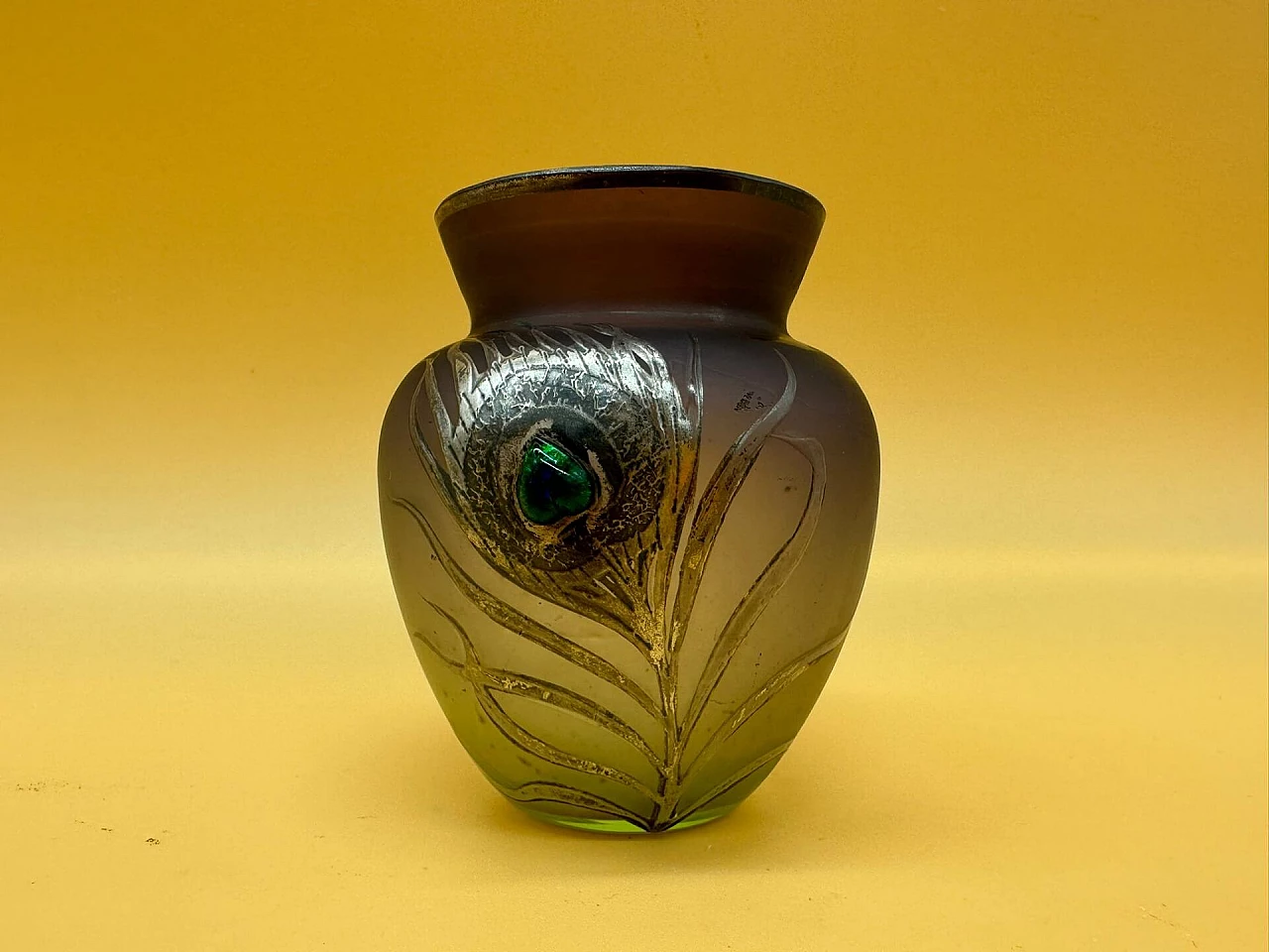 Glass vase with silvered peacock feather and green gem application, early 1900s 1