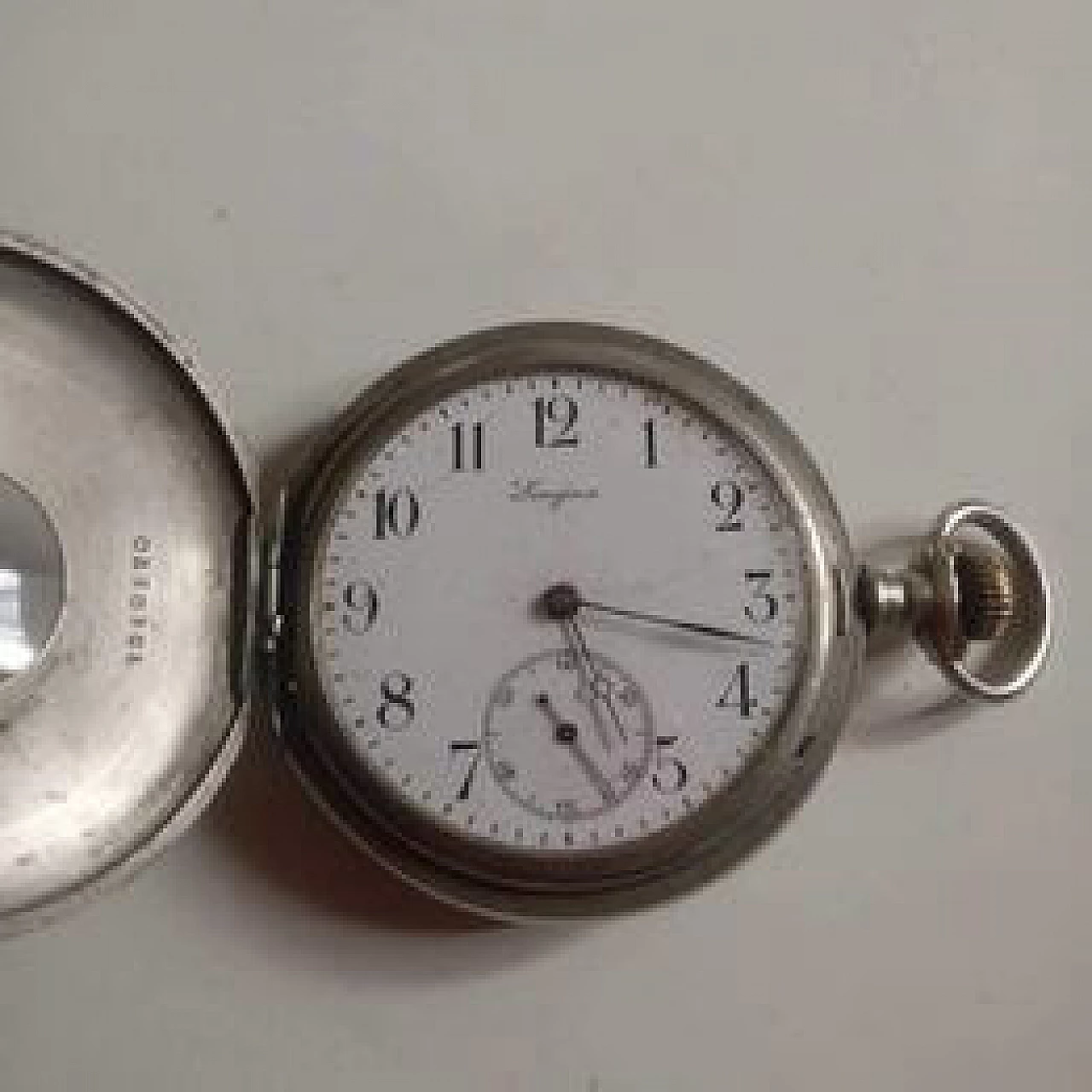 Polished steel pocket watch by Longines, late 19th century 1