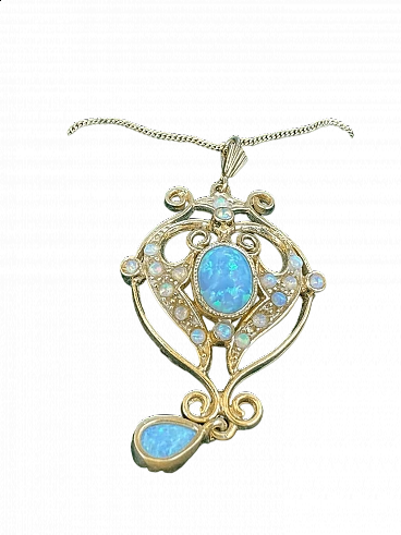 Gold pendant with stones and gems, early 1900s