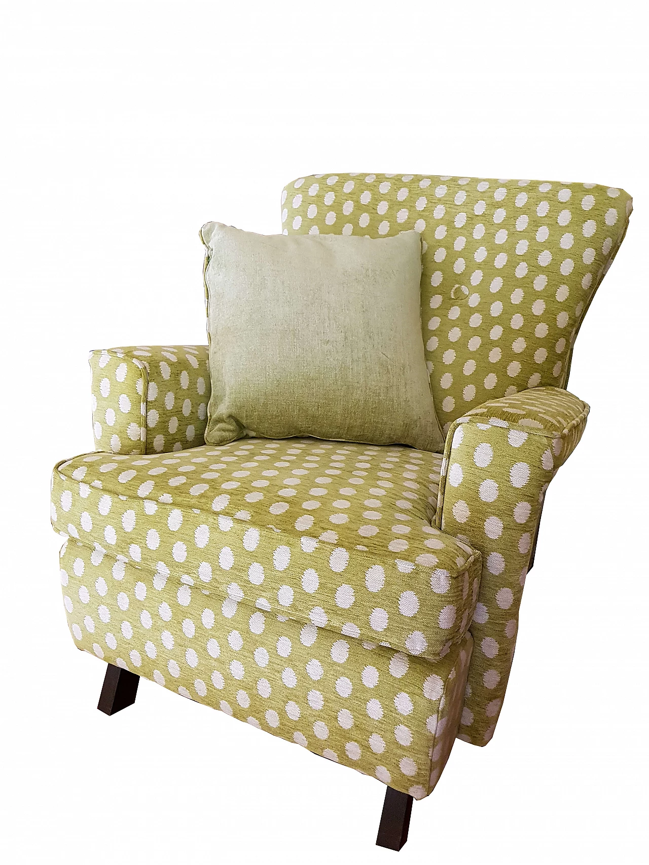 Green fabric armchair with white polka dots 1