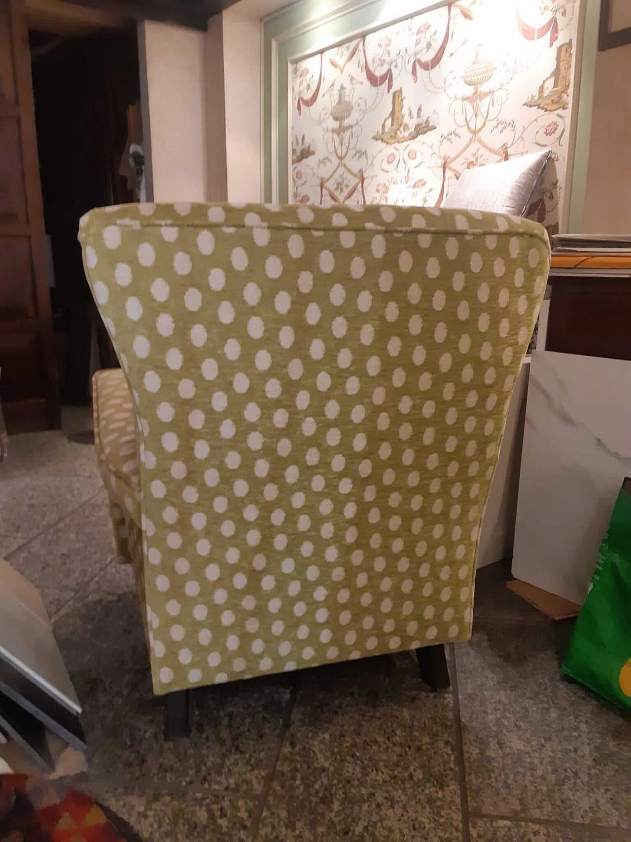 Green fabric armchair with white polka dots 5