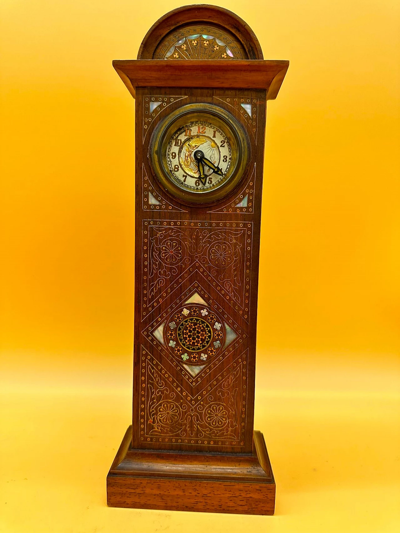 Mahogany table clock with mother-of-pearl decoration and inlays, early 20th century 1