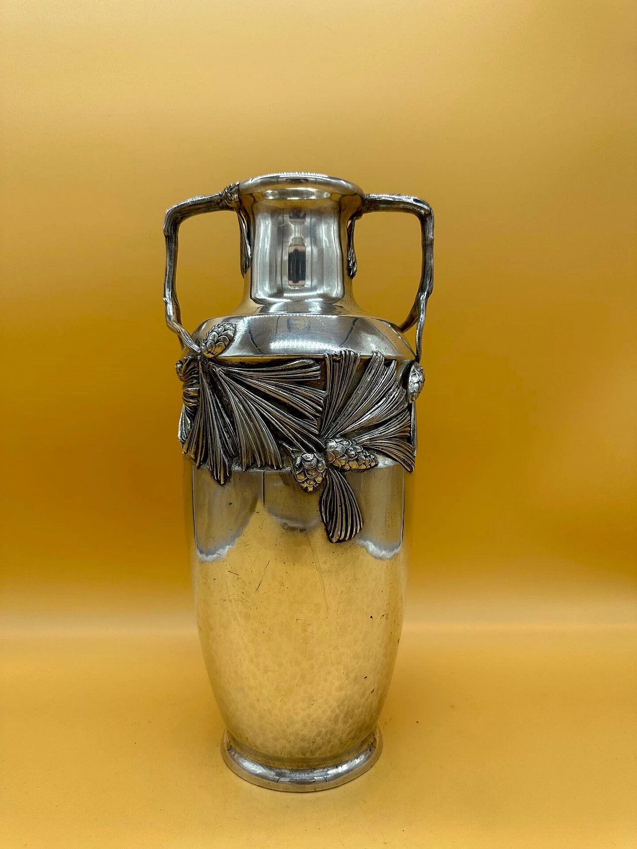 Metal vase with pine cones and needles, early 20th century 1