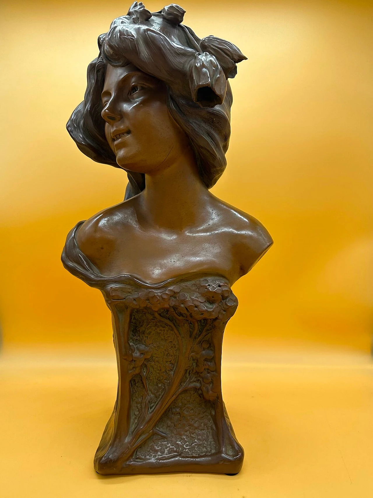 Bronze-plated terracotta bust of a young girl with decorations and flowers, early 20th century 3