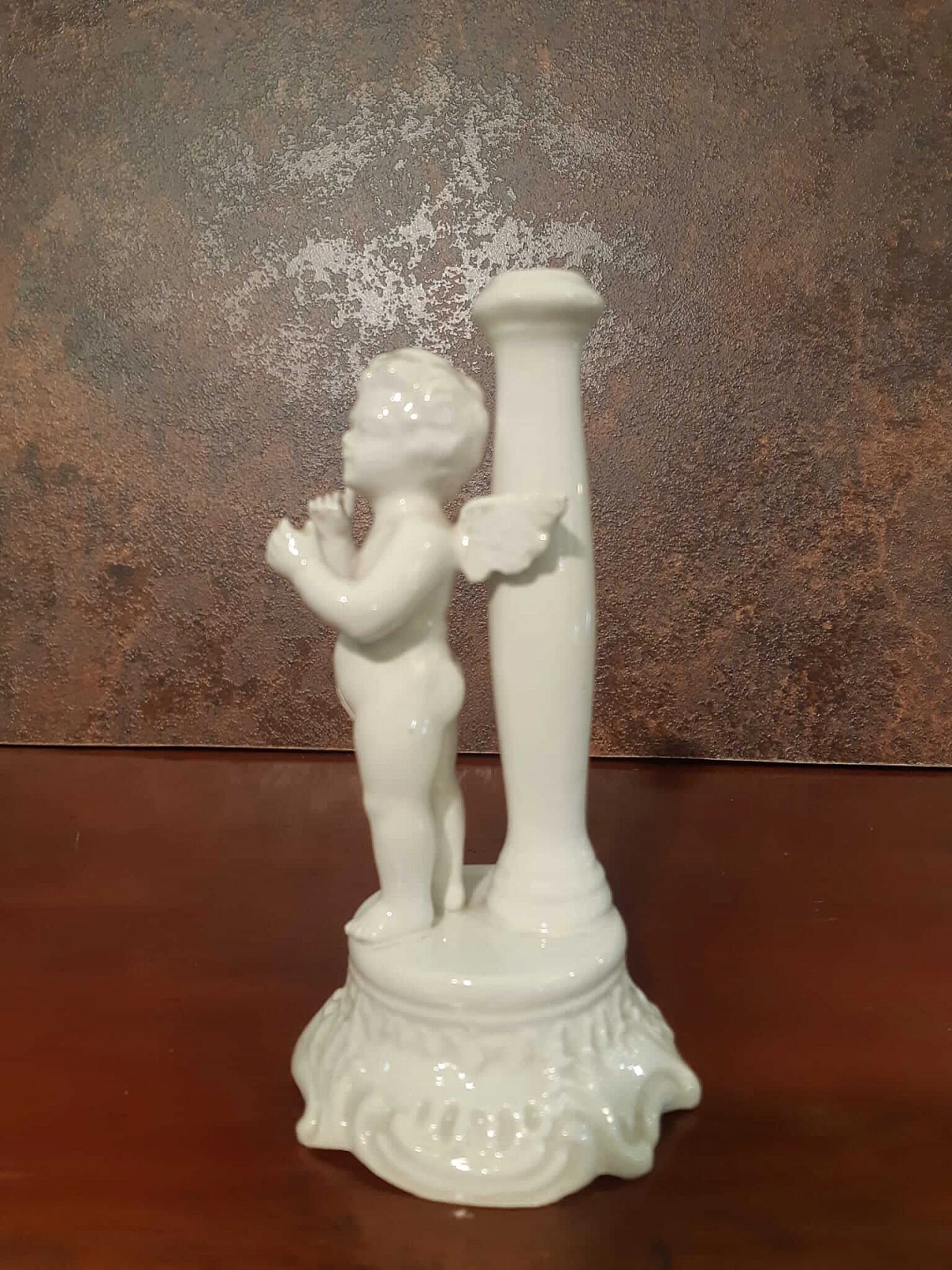 White porcelain candle holder with putto, early 20th century 1