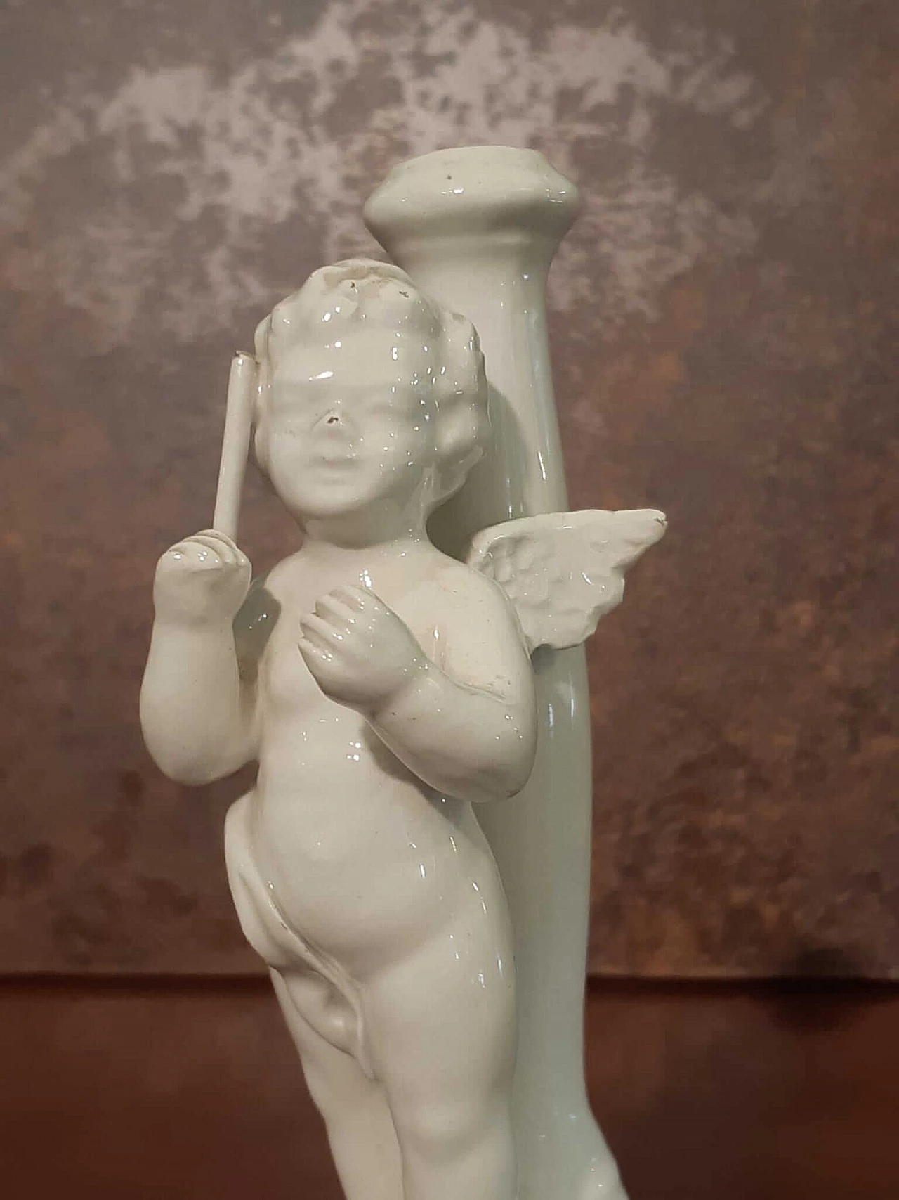 White porcelain candle holder with putto, early 20th century 2