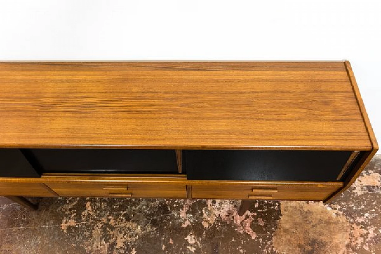 Danish teak sideboard with drawers and black sliding doors, 1960s 10