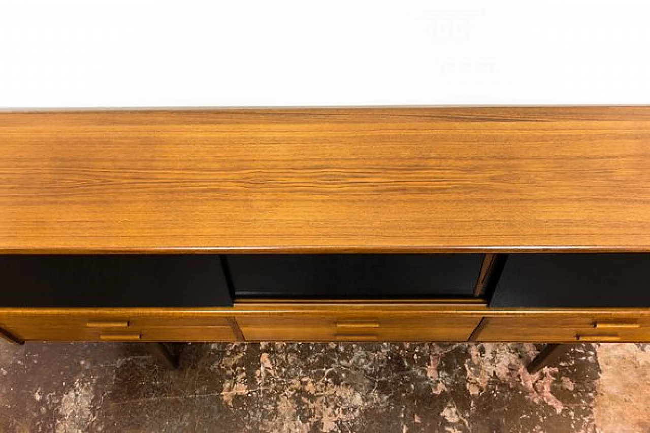 Danish teak sideboard with drawers and black sliding doors, 1960s 11