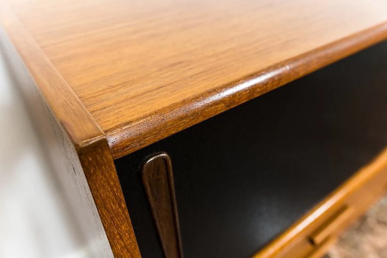 Danish teak sideboard with drawers and black sliding doors, 1960s 24