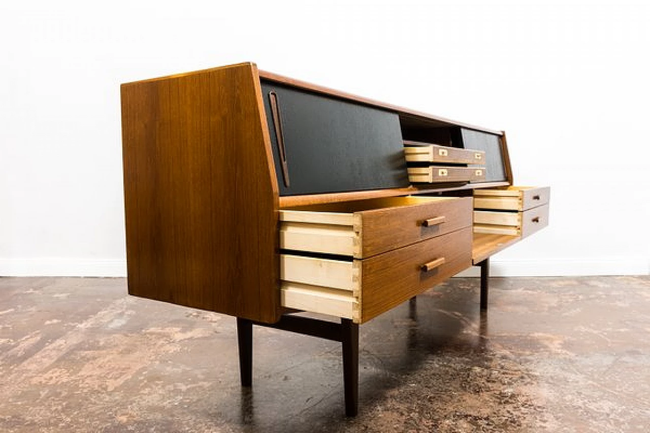 Danish teak sideboard with drawers and black sliding doors, 1960s 25