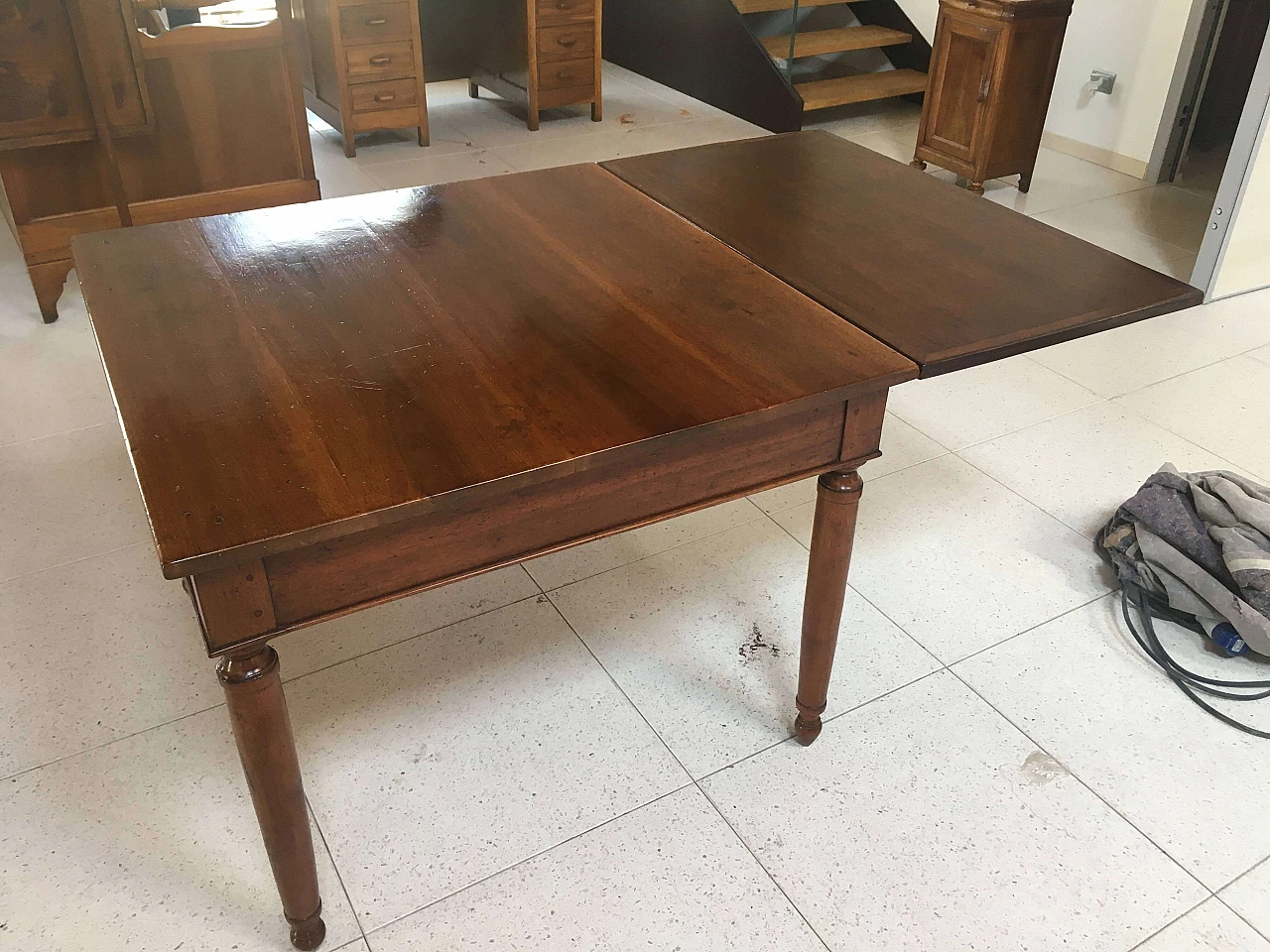 Directoire walnut extendable table with drawer, early 19th century 11