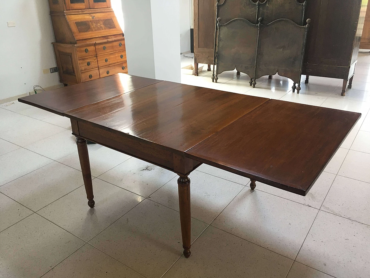 Directoire walnut extendable table with drawer, early 19th century 12