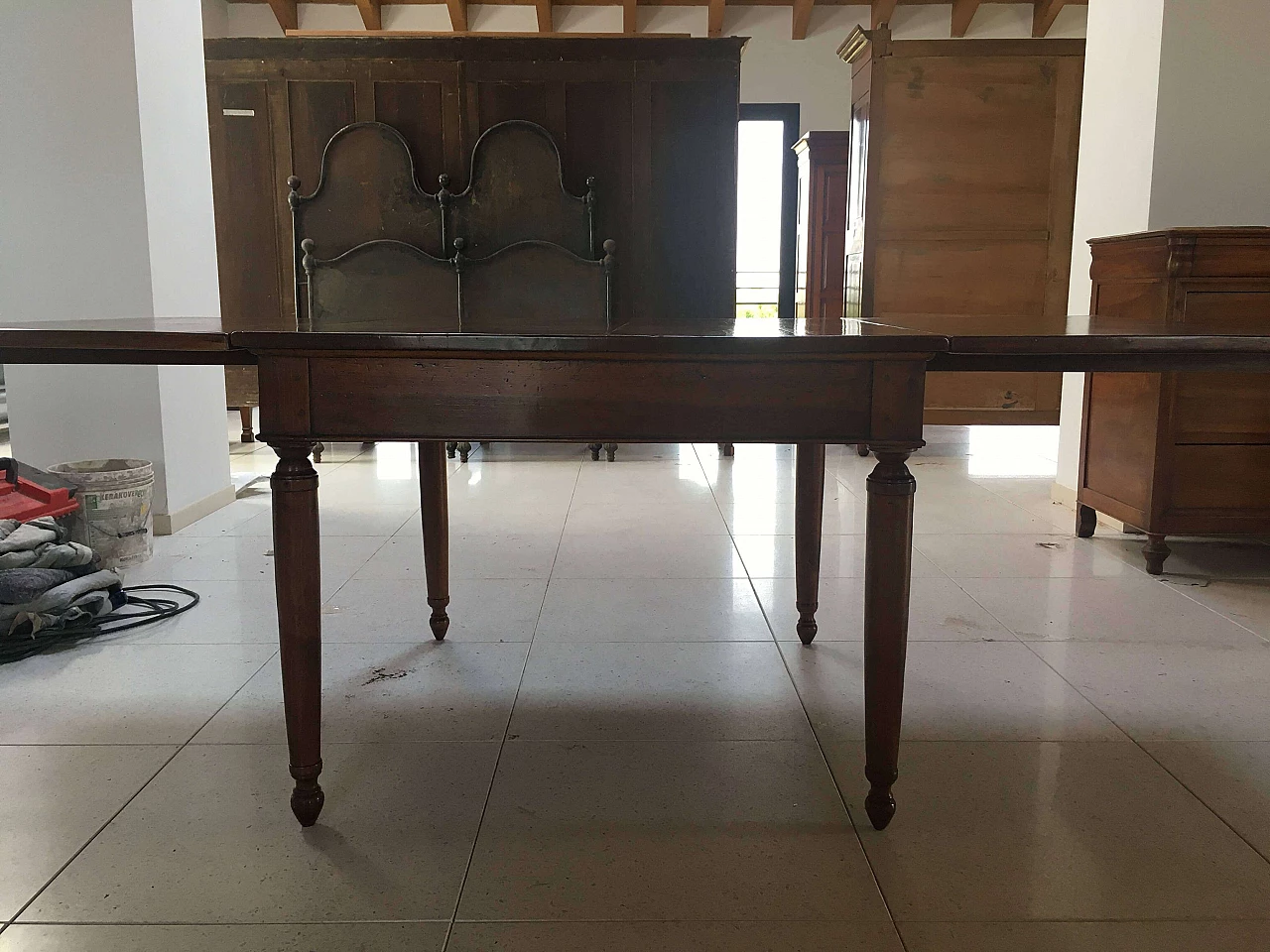 Directoire walnut extendable table with drawer, early 19th century 14